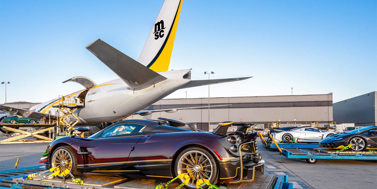 Luxury cars being prepared for loading onto MSC Air Cargo aircraft